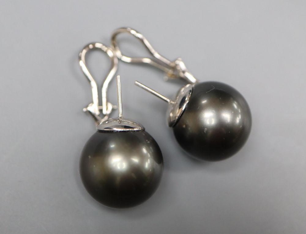 A large modern pair of white metal mounted grey freshwater pearl? earrings, diameter 15.6mm, gross 14.7 grams.